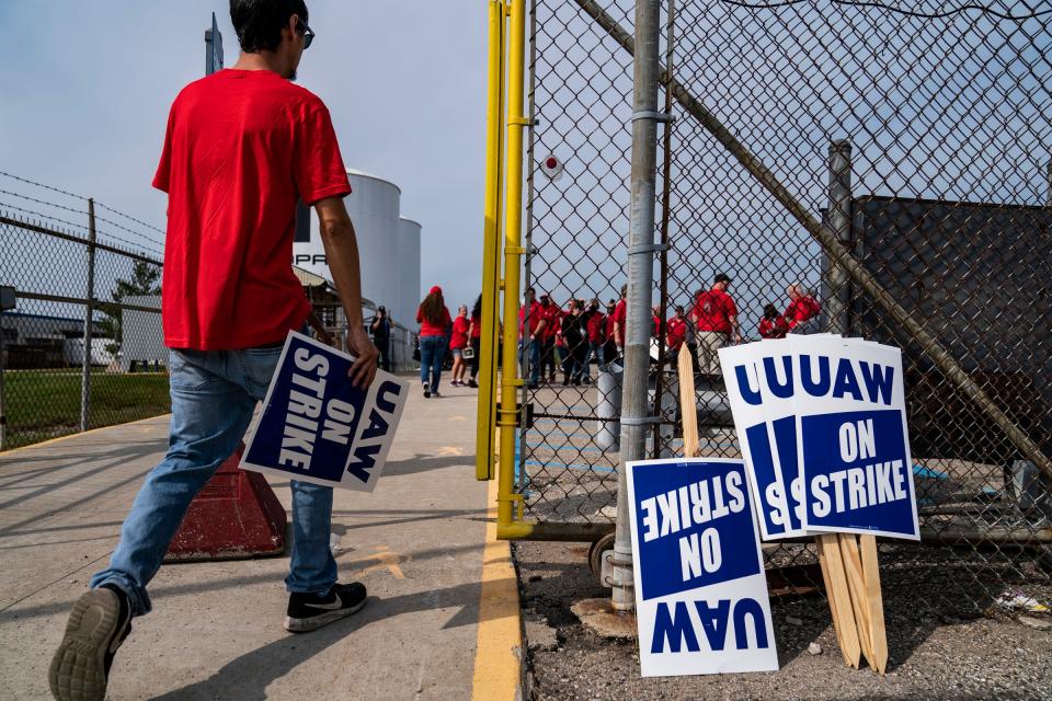 Center Line Packaging employee Joey Larue of Clinton Township joins fellow strikers as they walk out at noon from 38 GM and Stellantis parts distribution centers on Friday, Sept. 22, 2023.