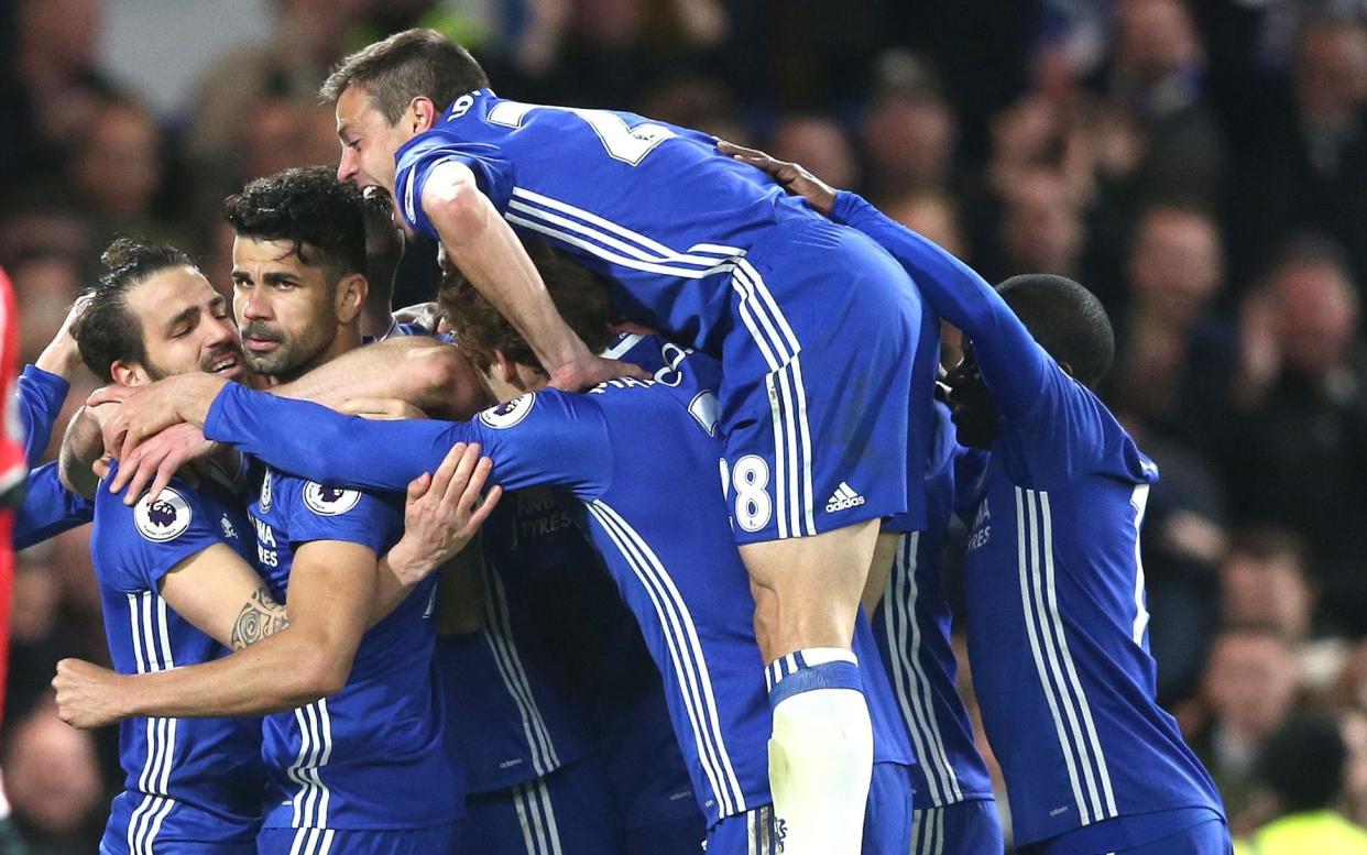 Chelsea players celebrate on Tuesday night - Rex Features