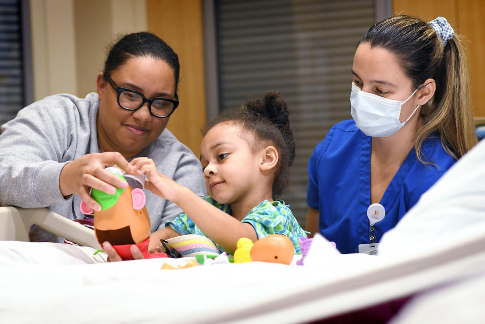 Riley, Bryson Crenshaw, Megan Crenshaw, Kristen Bartheld, Emily Lazarek, Dr. Francisco Angulo-Parker, physical therapy, Necrotizing facciitis (Courtesy Mike Dickbernd/Riley Children’s Health)