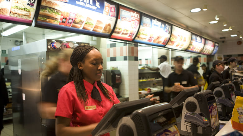 cashier taking order at mcdonald's