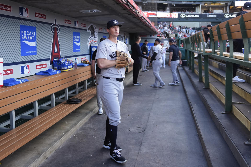 New York Yankees third baseman DJ LeMahieu stands in the dugout before the team's baseball game against the Los Angeles Angels, Tuesday, May 28, 2024, in Anaheim, Calif. (AP Photo/Ryan Sun)