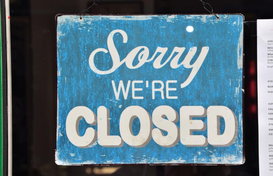 London, United Kingdom - November 15 2020: Detail of a Sorry We're Closed sign in a restaurant window in Central London during the second national lockdown in England.