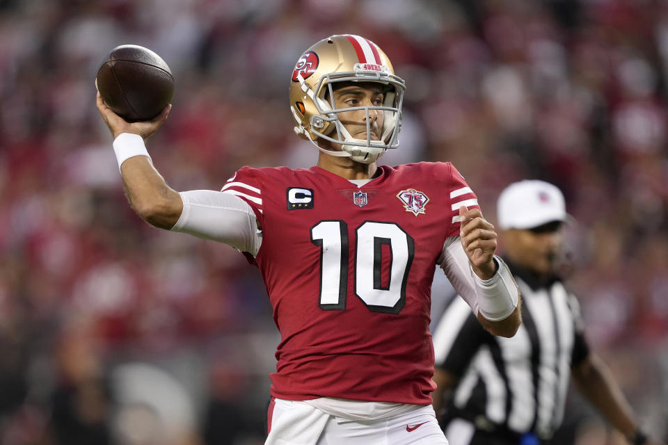 San Francisco 49ers quarterback Jimmy Garoppolo (10) passes against the Green Bay Packers during the first half of an NFL football game in Santa Clara, Calif., Sunday, Sept. 26, 2021. (AP Photo/Tony Avelar)