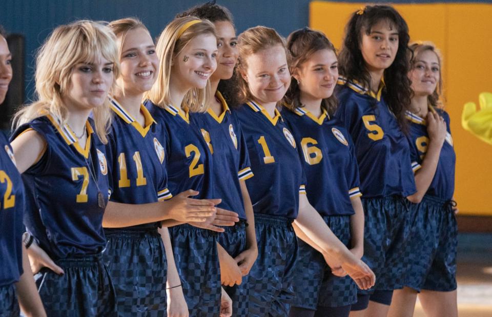 All you need is a yellow and navy blue varsity polo shirt and shorts to transform yourself into the soccer stars turned cannibals in Showtime’s “Yellowjackets.”