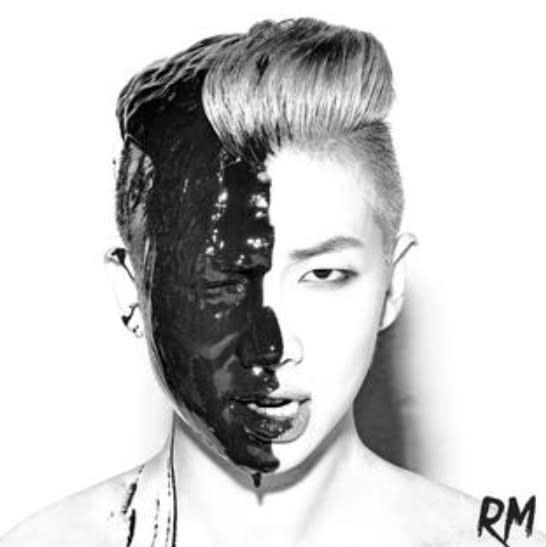 Cover of RM's mixtape RM featuring a close-up of RM with half his face covered in black paint