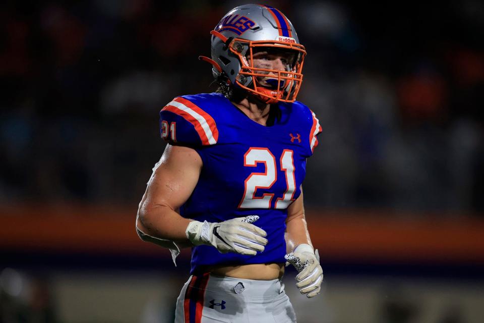 Bolles Bulldogs' Trent Carter (21) runs to the sideline during the first quarter of a regular season football game Friday, Sept. 2, 2022 at The Bolles School in Jacksonville. 