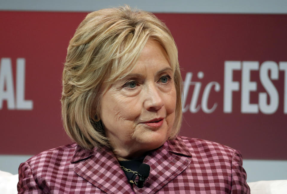 FILE - In this Tuesday, Oct. 2, 2018, file photo, former Secretary of State Hillary Clinton talks with Jeffrey Goldberg, editor in chief of The Atlantic, during The Atlantic Festival, in Washington. House Republicans say more investigation is needed into decisions made by the FBI and the Justice Department in 2016 as they brought an unceremonious end to their yearlong look at the department's handling of probes into Clinton's emails and Donald Trump's ties to Russia. (AP Photo/Alex Brandon, File)