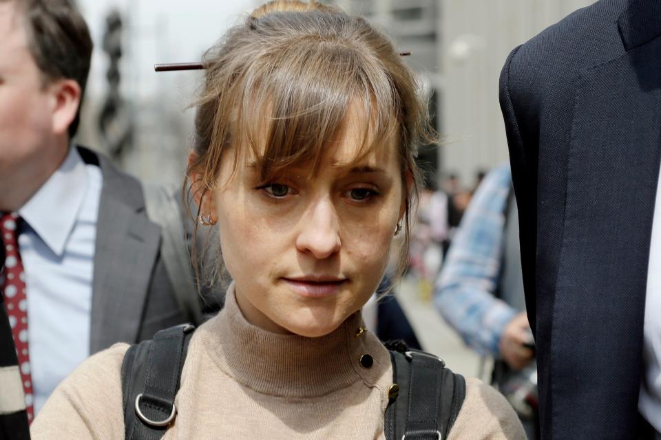 Actress Allison Mack leaves Brooklyn federal court Monday, April 8, 2019, in New York.