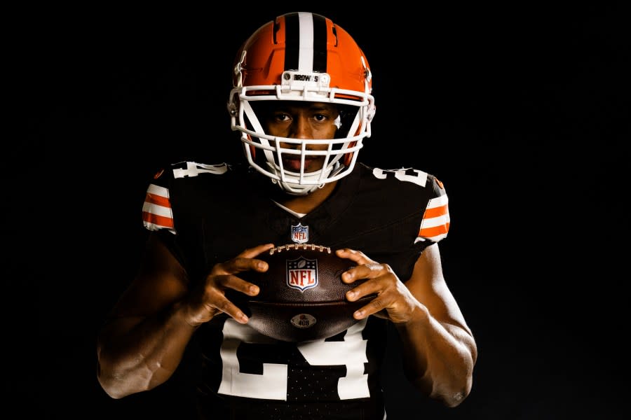 Running back Nick Chubb (24) poses for a photoshoot at CrossCountry Mortgage Campus on April 15, 2024.