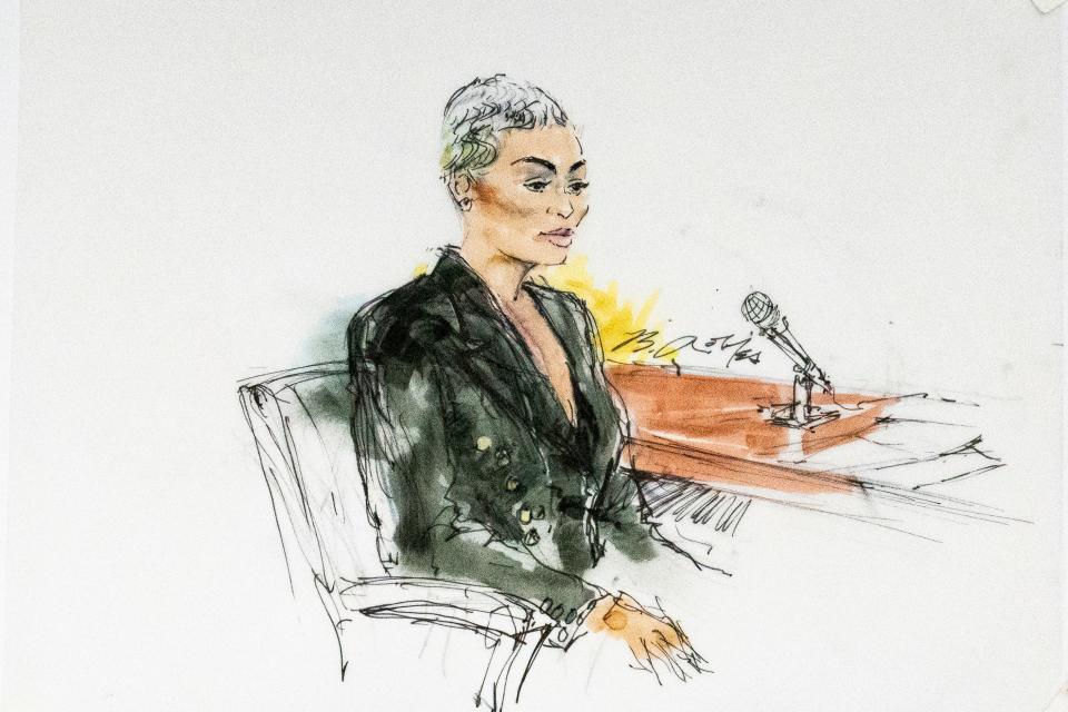In this courtroom artist sketch, former reality television star Blac Chyna sits in court in Los Angeles, Tuesday, April, 19, 2022. A jury has been seated in the trial that pits model and former reality television star Blac Chyna against the Kardashian family, who she alleges destroyed her TV career. (Bill Robles via AP) ORG XMIT: CADD201