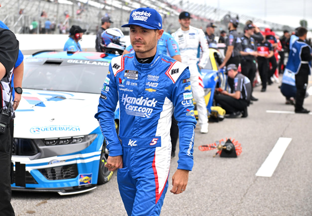 MADISON, IL - JUNE 01: Kyle Larson (#5 Henrick Motorsports HendrickCars.com Chevrolet) walks down pit road to his car to qualify for the NASCAR Cup Series Enjoy Illinois 300 presented by Ticketsmarter on June 01, 2024, at World Wide Technology Raceway at Gateway, Madison, IL.  (Photo by Keith Gillett/Icon Sportswire via Getty Images)