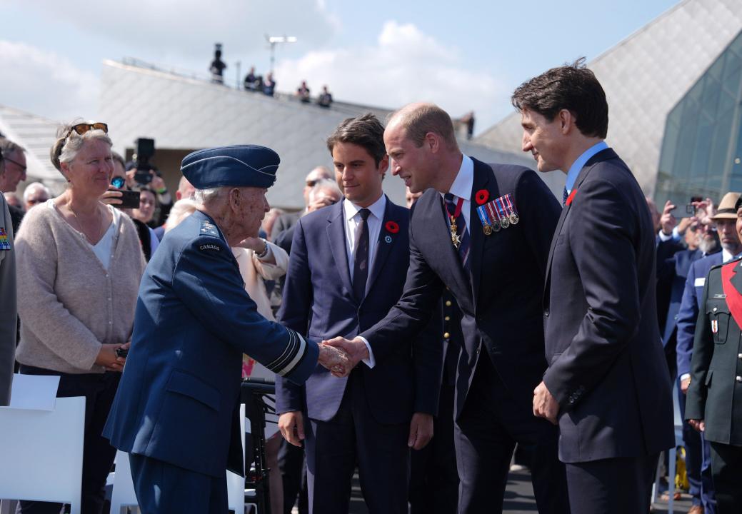 The Prince of Wales meets Richard Rohmer, 100, one of the most decorated Canadian veterans, with Canadian prime minister Justin Trudeau. (PA)