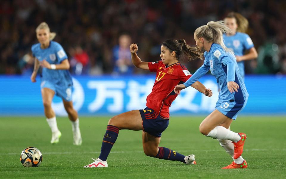 Alex Greenwood watches Spain's Alba Redondo