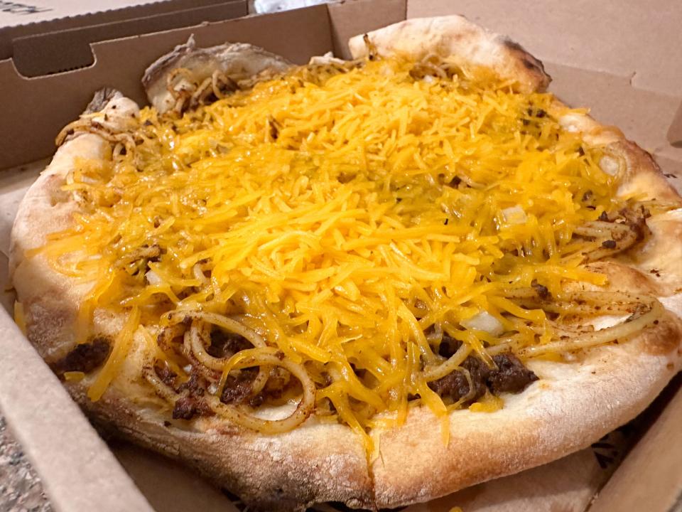 Catch-a-Fire Pizza's Cincinnati Chili pizza, which features house Cincinnati-style chili, spaghetti noodles, cheddar cheese, oyster crackers and onions.