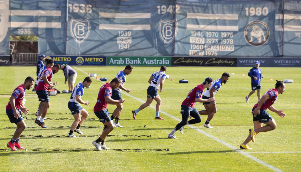 Bulldogs' players of the National Rugby League train in Sydney Friday, May 15, 2020. The National Rugby League will restart its interrupted season on May 28. (Craig Golding/AAP Image via AP)