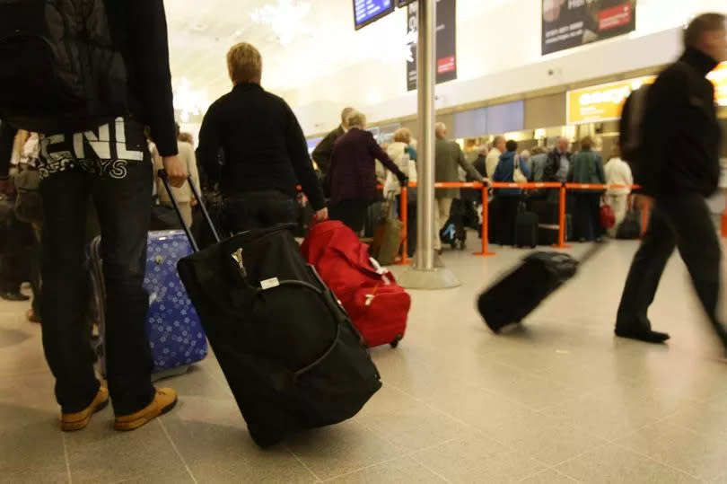 Delays at Manchester Airport following a power cut -Credit:PA