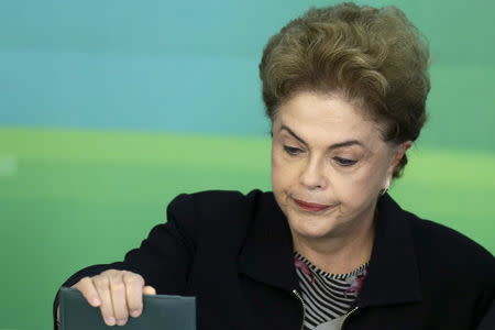 Brazil's President Dilma Rousseff looks on during a meeting with rectors of federal universities at the Planalto Palace in Brasilia, Brazil March 11, 2016. REUTERS/Ueslei Marcelino