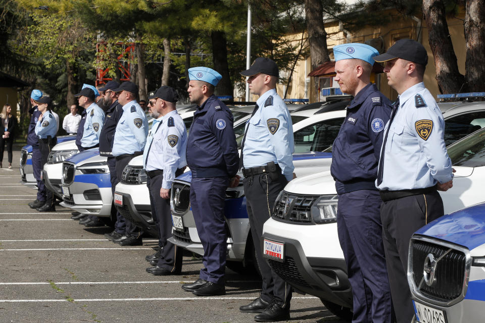 Frontex Standing Corps and Macedonian Border Police officers are lined up during the official launch of the Frontex Joint Operation in North Macedonia, at police barracks in Skopje, North Macedonia, on Thursday, April 20. 2023. (AP Photo/Boris Grdanoski)