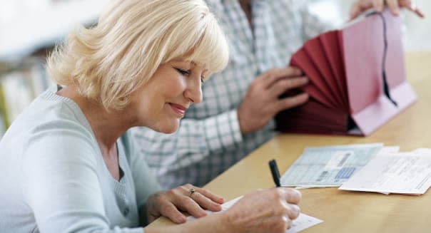 Senior Couple with Financial Documents