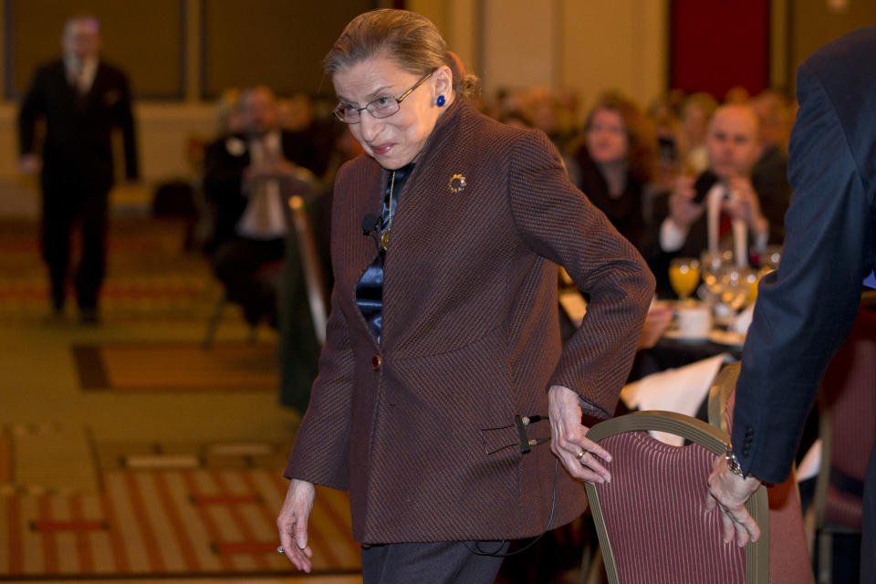 Supreme Court Justice Ruth Bader Ginsburg arrives to speak to the Northern Virginia Technology Council, Tuesday, Dec. 17, 2013, in Reston, Va. She took part in what event organizers describe as a "fireside chat" with former U.S. Solicitor General Ted Olson. Olson served as solicitor general from 2001 to 2004 under President George W. Bush and is still a frequent advocate before the court. (AP Photo/Jacquelyn Martin)