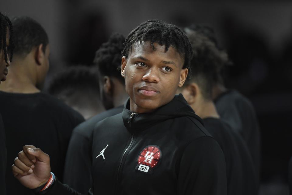 FILE - Houston guard Marcus Sasser is shown on the court during a timeout in the second half of an NCAA college basketball game against SMU, Sunday, Feb. 27, 2022, in Houston. Sasser was named to The Associated Press preseason All-America team, Monday, Oct. 24, 2022.(AP Photo/Justin Rex, File)