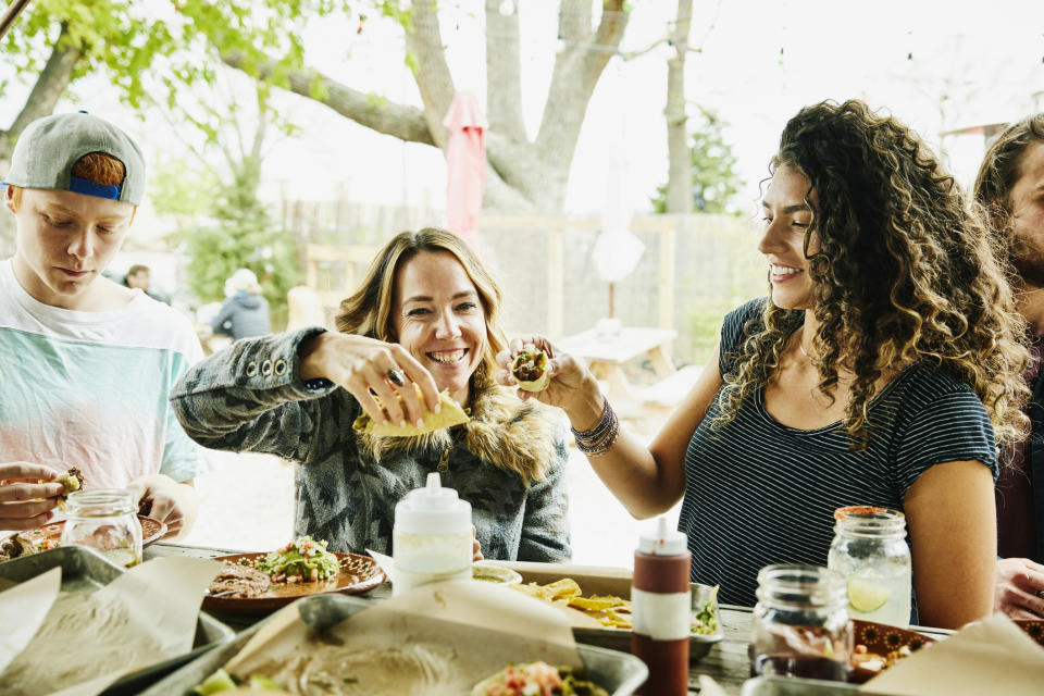 People having dinner together