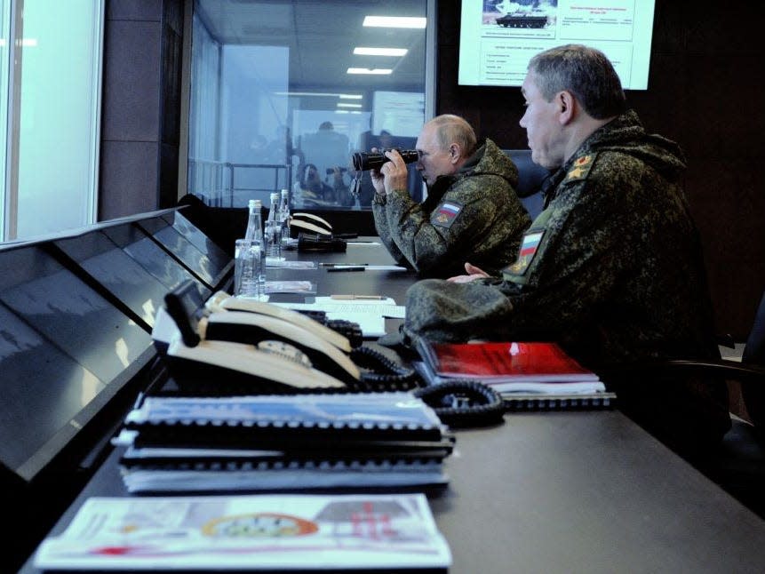 Russian President Vladimir Putin (L), accompanied by Valery Gerasimov, the chief of the Russian General Staff, oversees the 'Vostok-2022' military exercises at the Sergeevskyi training ground outside the city of Ussuriysk on the Russian Far East on September 6, 2022.