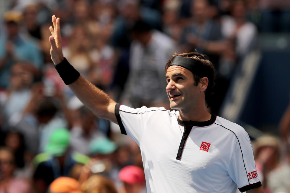 Roger Federer celebrates after winning a match.