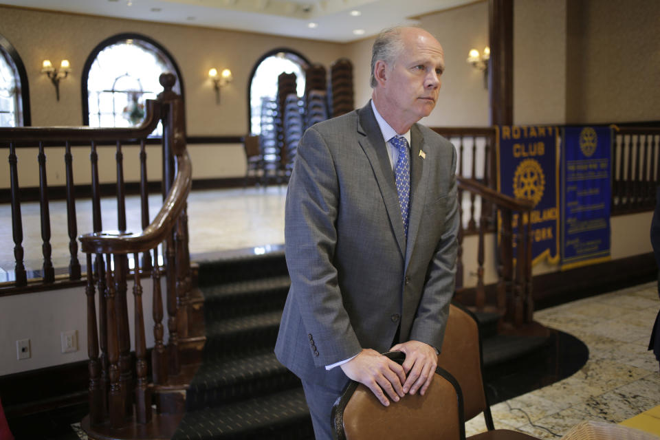 In this Oct. 2, 2018 photo, Rep. Dan Donovan, R-NY, takes questions from members of the Rotary Club in the Staten Island borough of New York. Donovan, a lifelong Staten Islander, says that his Democratic challenger only moved to the borough to run for Congress. (AP Photo/Seth Wenig)