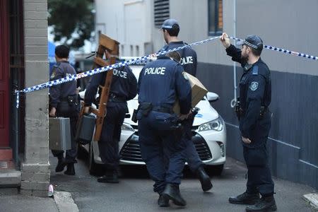 Police raid a property in the Sydney suburb of Surry Hills, Australia, July 31, 2017 in the wake of a plot again Australia's aviation sector. AAP/Dean Lewins/via REUTERS