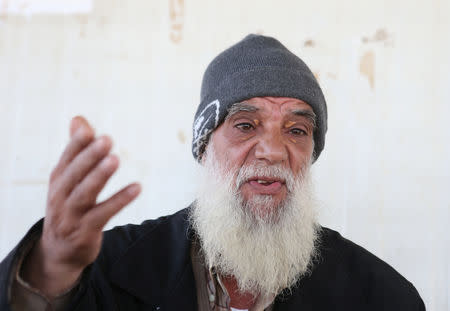 Abu Ibrahim, a Syrian refugee, gestures during an interview with Reuters at a refugee camp in Akkar, northern Lebanon, November 27, 2018. REUTERS/Mohamed Azakir