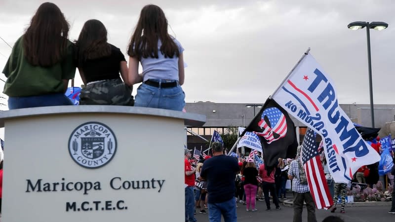 Supporters of President Donald Trump demonstrate at a “Stop the Steal” rally in front of the Maricopa County Elections Department office on Nov. 7, 2020. (Photo by Mario Tama/Getty Images)