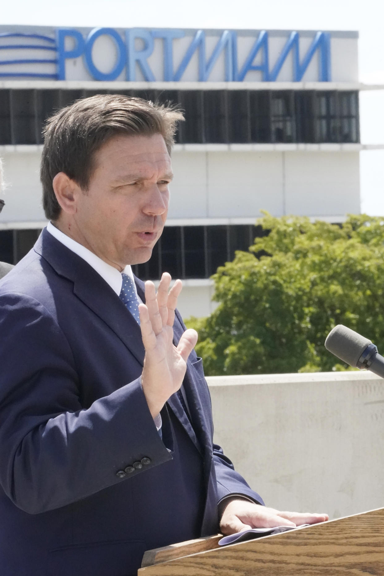 Florida Gov. Ron DeSantis speaks during a news conference, Thursday, April 8, 2021, at PortMiami in Miami. DeSantis announced a lawsuit against the federal government and the CDC demanding that cruise ships be allowed to sail. (AP Photo/Wilfredo Lee)