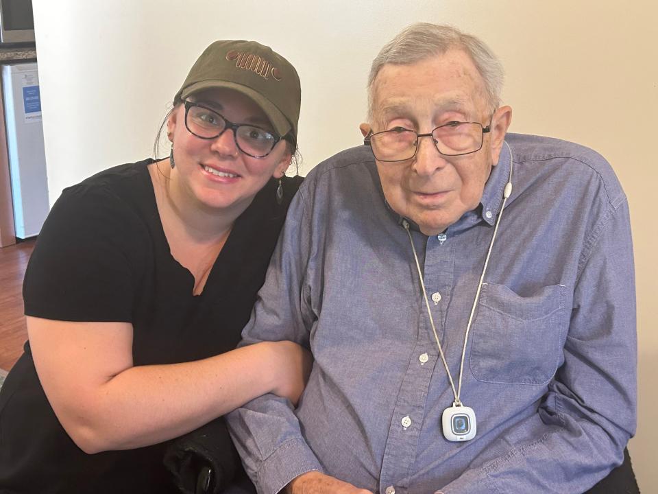 Ben Chlebnikow, a resident of Creekside Village in Hagerstown, smiles with his granddaughter, Hannah Chlebnikow, recently at the care home. Ben Chlebnikow, a WWII veteran and former Mack Trucks employee, turned 104 on Aug. 17.