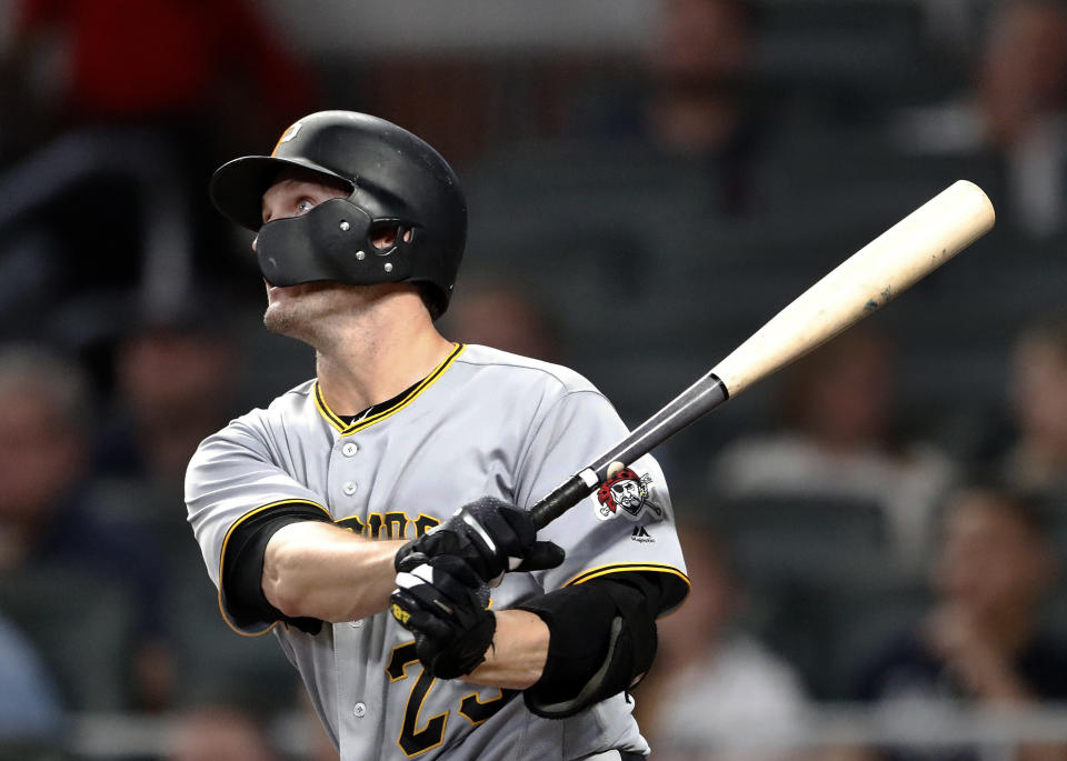 Pittsburgh Pirates' David Freese (23) watches his RBI single during the sixth inning of a baseball game against the Atlanta Braves on Friday, Aug. 31, 2018, in Atlanta. (AP Photo/John Bazemore)