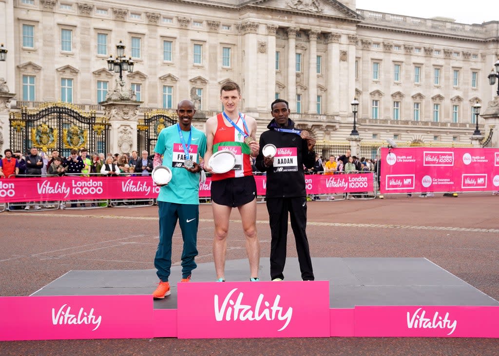 Sir Mo Farah (left) was second behind Ellis Cross (centre) at the Vitality London 10,000 (Adam Davy/PA) (PA Wire)