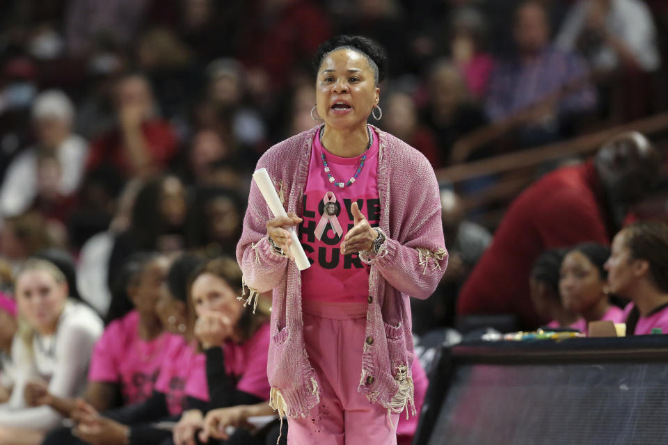 South Carolina head coach Dawn Staley gives instructions to her team during the first half of an NCAA college basketball game against Mississippi Sunday, Feb. 4, 2024, in Columbia, S.C. (AP Photo/Artie Walker Jr.)