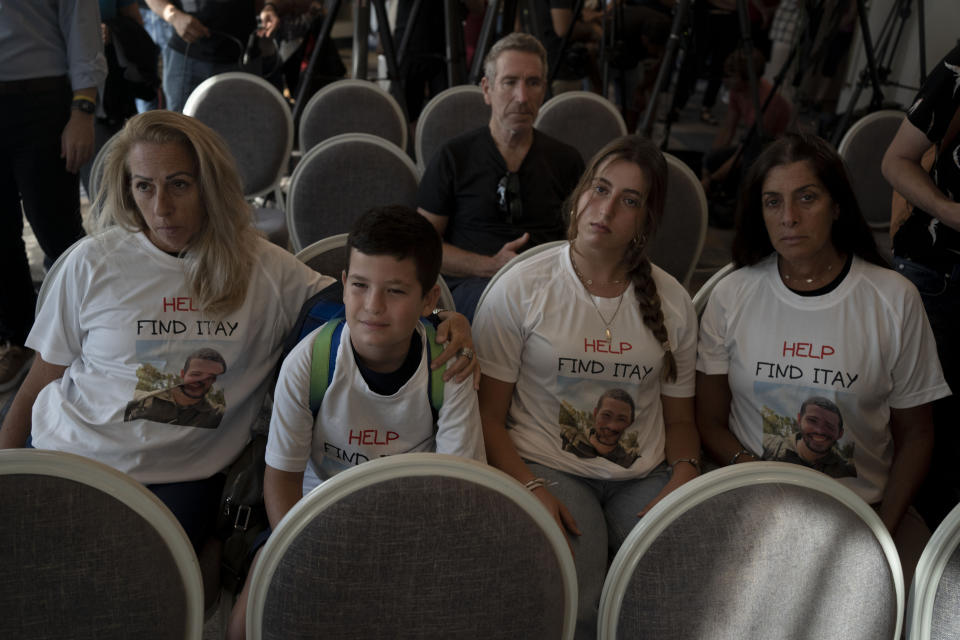 The family of Itai Chen, an Israeli-American soldier missing since a Hamas surprise attack on the Gaza border, attend a news conference by U.S. citizens whose relatives are missing in Tel Aviv, Israel, Tuesday, Oct. 10, 2023. (AP Photo/Maya Alleruzzo)