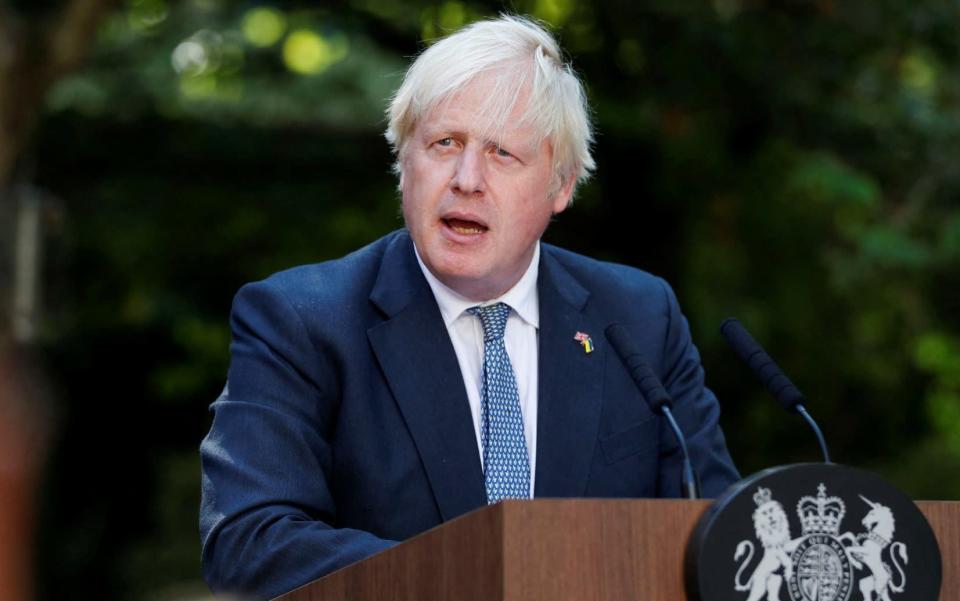 Boris Johnson presenting the Points of Light awards in Downing Street on Tuesday. The Prime Minister faces a privileges committee investigation on whether he misled Parliament - Peter Nicholls/Getty Images