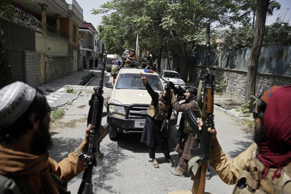 FILE - In this Aug. 19, 2021 file photo, Taliban fighters patrol in Kabul, Afghanistan. The Taliban win in Afghanistan is giving a boost to militants in neighboring Pakistan. The Pakistani Taliban, known as the TTP, have become emboldened in tribal areas along the border with Afghanistan. (AP Photo/Rahmat Gul, File)