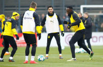 Soccer Football - Usain Bolt participates in a training session with Borussia Dortmund - Strobelallee Training Centre, Dortmund, Germany - March 23, 2018 Borussia Dortmund's Nuri Sahin and Usain Bolt during training REUTERS/Thilo Schmuelgen