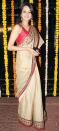 A very popular colour combination in ethnic wear, Natassha’s sari is really classy. You could wear it to a day wedding reception, a pooja ceremony or even a mehendi function.