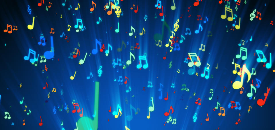 Lots of brightly colored music notes on a blue background