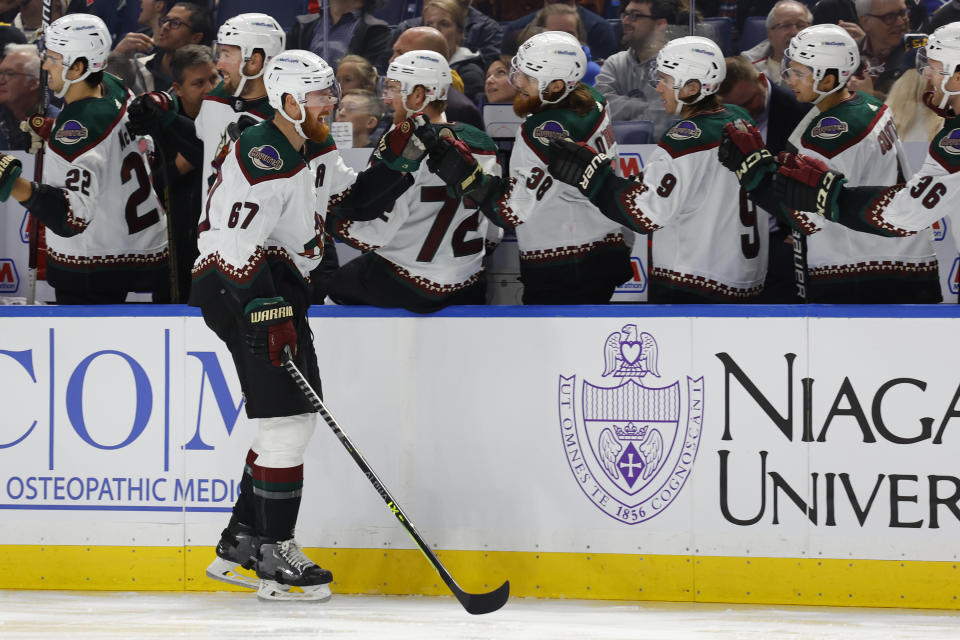 Arizona Coyotes left wing Lawson Crouse (67) celebrates after his goal during the first period of an NHL hockey game against the Buffalo Sabres, Tuesday, Nov. 8, 2022, in Buffalo, N.Y. (AP Photo/Jeffrey T. Barnes)