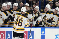 Boston Bruins center David Krejci (46) celebrates with the bench after his goal against the Tampa Bay Lightning during the first period of an NHL hockey game Monday, Nov. 21, 2022, in Tampa, Fla. (AP Photo/Chris O'Meara)