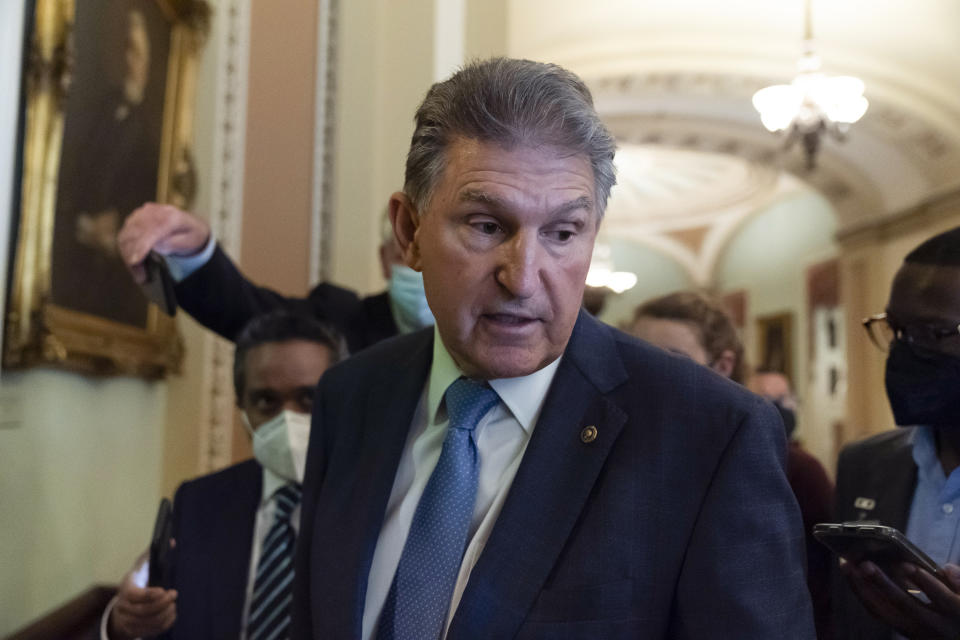 Sen. Joe Manchin, D-W.Va., speaks with reporters on Capitol Hill, Thursday, Oct. 7, 2021, in Washington. (AP Photo/Alex Brandon)