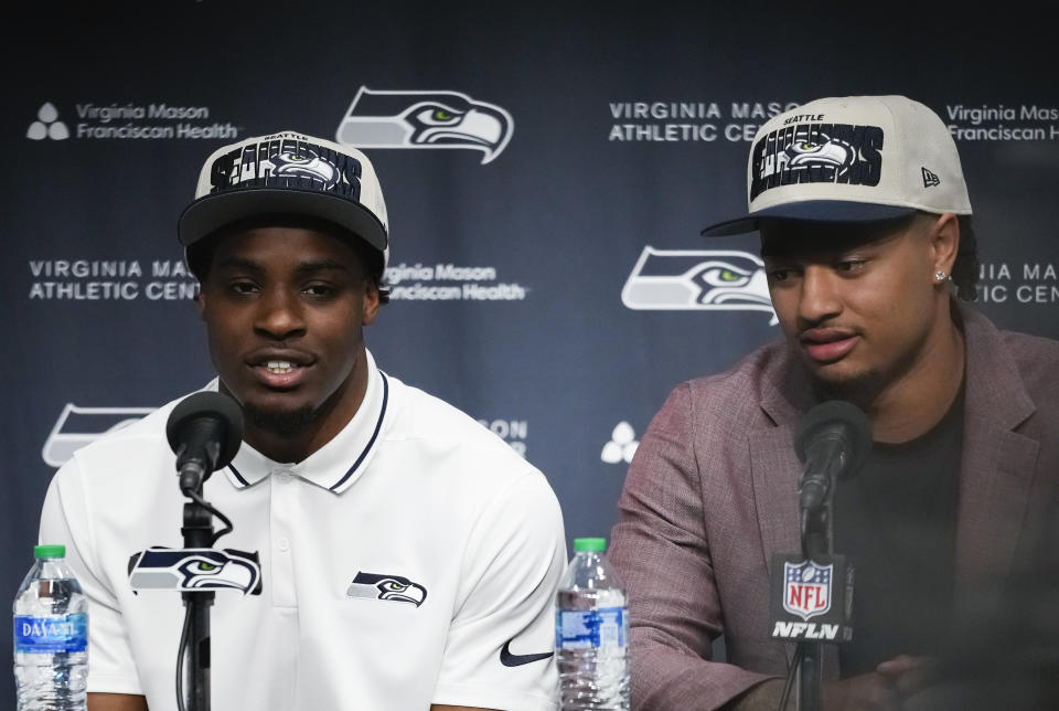 The Seattle Seahawks made a pair of strong first-round picks in Devon Witherspoon, left, and Jaxon Smith-Njigba. (AP Photo/Lindsey Wasson)