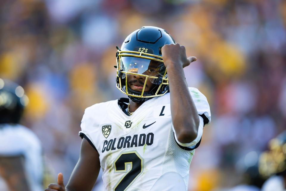 Colorado Buffaloes quarterback Shedeur Sanders (2) celebrates after scoring a touchdown against the Arizona State Sun Devils in the first half at Mountain America Stadium, Home of the ASU Sun Devils, on Oct 7, 2023, in Tempe, Arizona. Mandatory Credit: Mark J. Rebilas-USA TODAY Sports