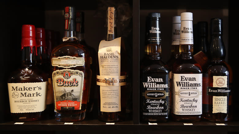 shelf of bourbon bottles