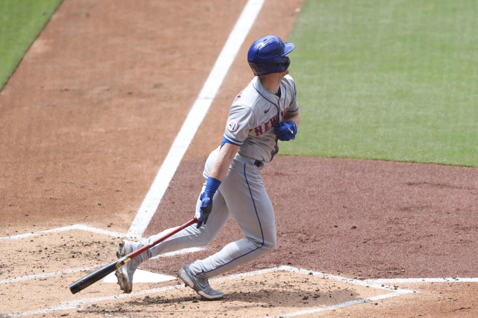 New York Mets' Billy McKinney hits an RBI single to center field in the third inning of a baseball game against the San Diego Padres Sunday, June 6, 2021, in San Diego. (AP Photo/Derrick Tuskan)